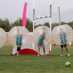 Stag group playing bubble football